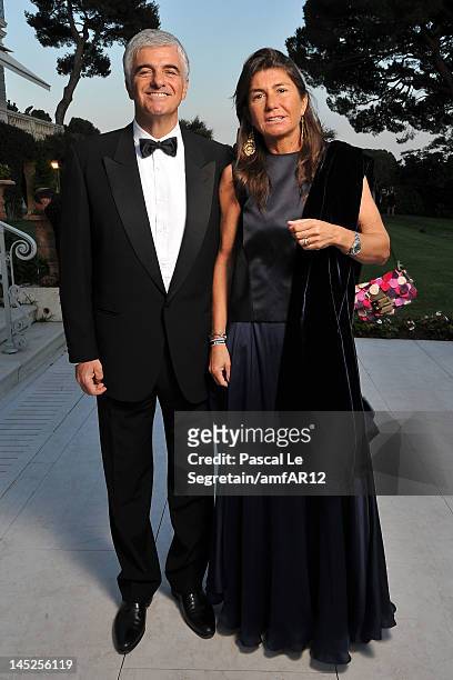 Antonio Belloni, Group Managing Director and Director LVMH, and guest attend the 2012 amfAR's Cinema Against AIDS during the 65th Annual Cannes Film...