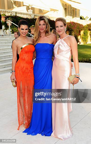 Leona Koenig, Nicole Junkermann and Eva Dichand attend the 2012 amfAR's Cinema Against AIDS during the 65th Annual Cannes Film Festival at Hotel Du...