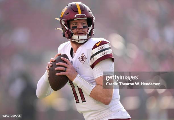 Carson Wentz of the Washington Commanders warms up prior to a game against the San Francisco 49ers at Levi's Stadium on December 24, 2022 in Santa...