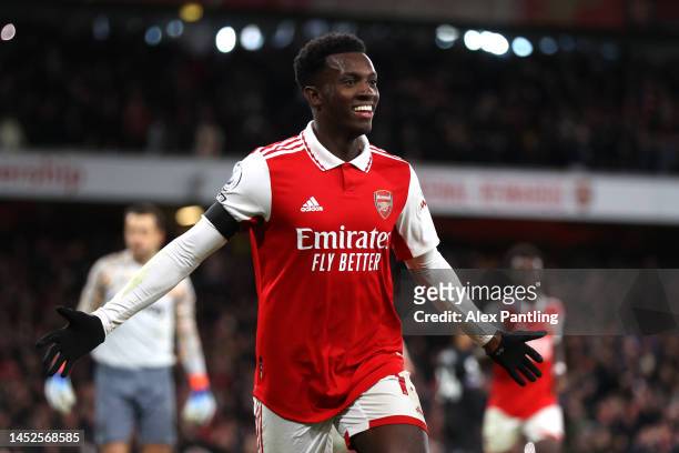 Eddie Nketiah of Arsenal celebrates after scoring their side's third goal during the Premier League match between Arsenal FC and West Ham United at...