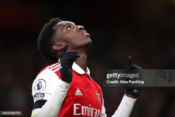 Eddie Nketiah of Arsenal celebrates after scoring their side's third goal during the Premier League match between Arsenal FC and West Ham United at...