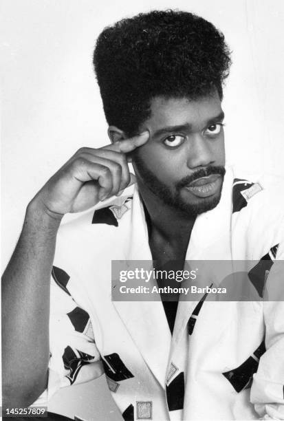 Portrait of American rhythm & blues and funk musician Larry Blackmon from the band Cameo as he poses against a white background, New York, New York,...