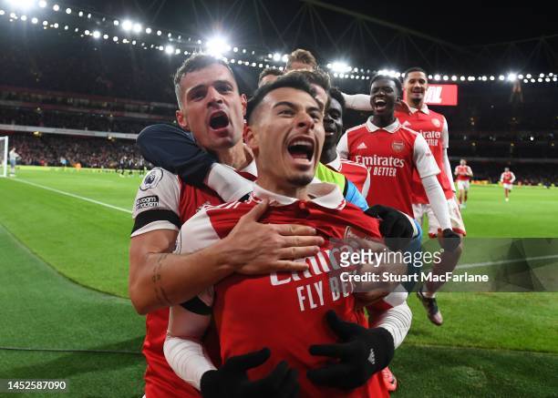 Gabriel Martinelli celebrates scoring the 2nd Arsenal goal with Granit Xhaka during the Premier League match between Arsenal FC and West Ham United...