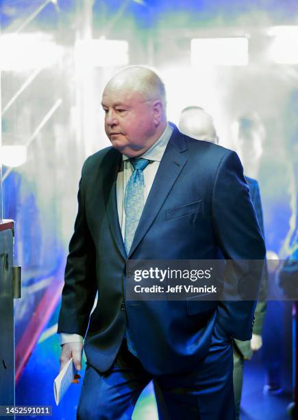 Head coach Bruce Boudreau of the Vancouver Canucks walks to the bench during their NHL game against the St. Louis Blues at Rogers Arena December 19,...
