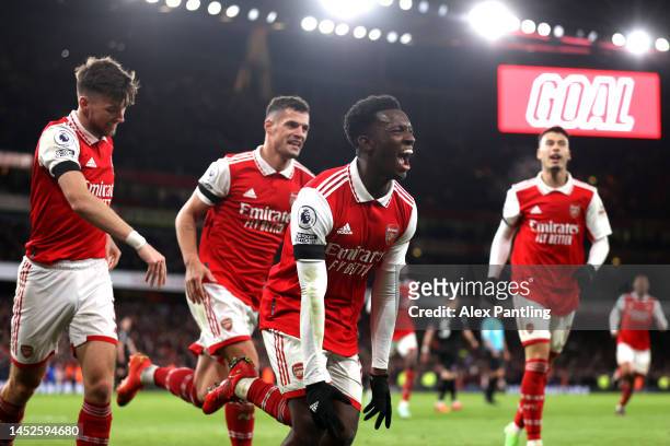 Eddie Nketiah of Arsenel celebrates after scoring his sides third goal during the Premier League match between Arsenal FC and West Ham United at...