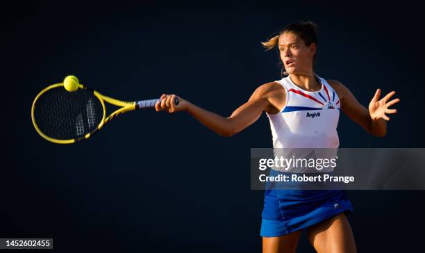 Chloe Paquet of France in action against Martina di Giuseppe of Italy during the first round of qualifications of the Palermo Ladies Open at Country...