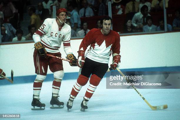 Ron Ellis of Canada defends against Alexander Yakushev of the Soviet Union during Game 1 of the 1972 Summit Series on September 2, 1972 at the...