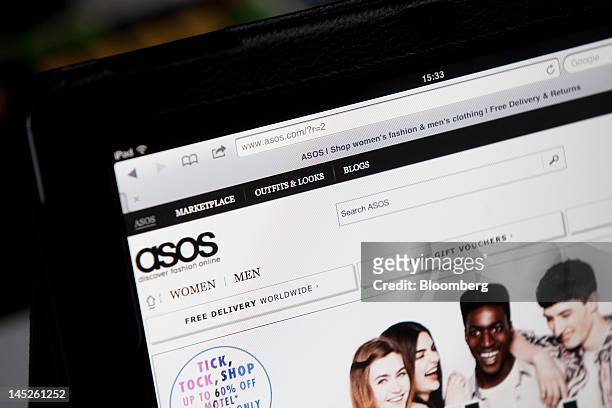 Page from the Asos.com website, an online fashion retailer operated by Asos Plc, is displayed on an Apple Inc. IPad in London, U.K., on Thursday, May...