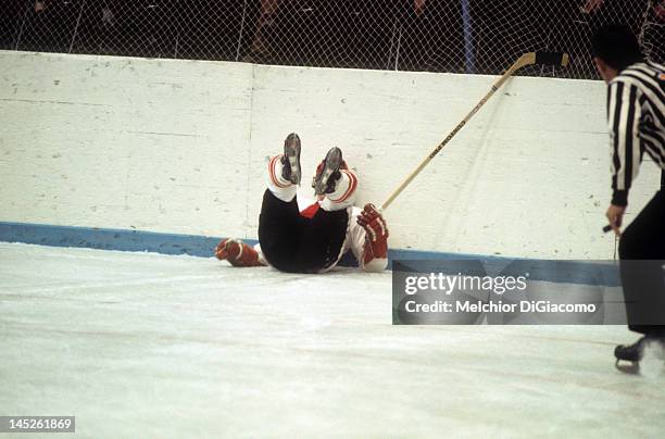 Paul Henderson of Canada crashes into the boards during Game 5 of the 1972 Summit Series on September 22, 1972 at the Luzhniki Ice Palace in Moscow,...
