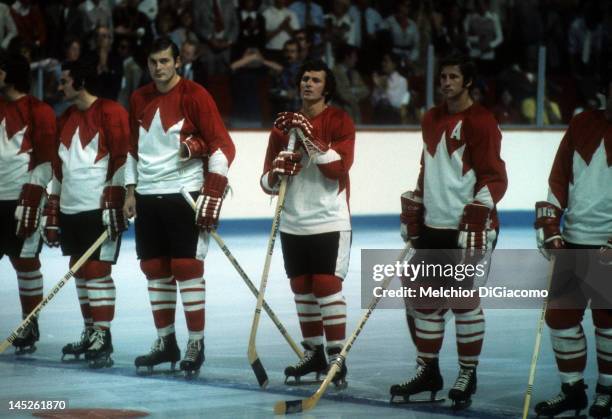 Mickey Redmond, Pete Mahovlich, Paul Henderson and Jean Ratelle of Canada stand on the ice before Game 1 of the 1972 Summit Series against the Soviet...