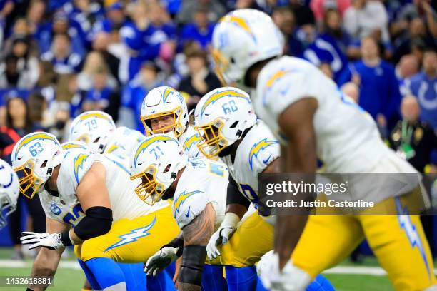 Justin Herbert of the Los Angeles Chargers looks on during the game against the Indianapolis Colts at Lucas Oil Stadium on December 26, 2022 in...