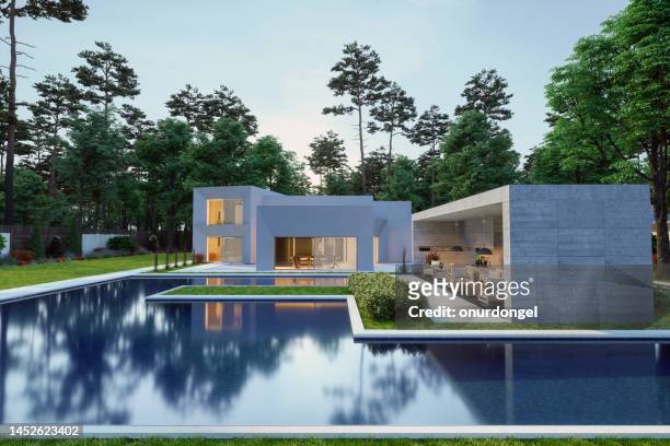 luxuriöse villa außen mit pool - luxury property stock-fotos und bilder