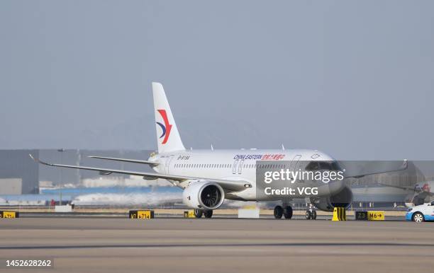 The first C919 large passenger aircraft of China Eastern Airlines lands at Beijing Capital International Airport during its 100-hour verification...