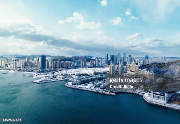 city coastline after snow - dalian stock pictures, royalty-free photos & images