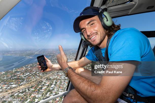 Stefanos Tsitsipas of Greece poses while on a helicopter flight during a United Cup media opportunity at Rottnest Island on December 27, 2022 in...