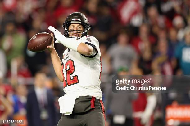 Quarterback Tom Brady of the Tampa Bay Buccaneers drops back to pass during the NFL game against the Arizona Cardinals at State Farm Stadium on...