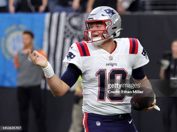 Quarterback Mac Jones of the New England Patriots reacts after thinking he scored a touchdown on a quarterback sneak against the Las Vegas Raiders...
