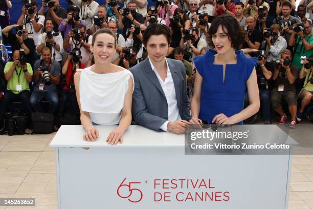 Actor Arta Dobroshi, Raphael Personnaz and Clotilde Hesme pose at the "Trois Mondes" photocall during the 65th Annual Cannes Film Festival at Palais...
