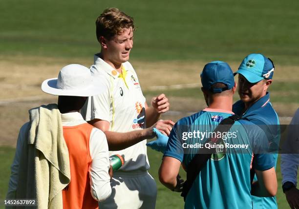 Cameron Green of Australia leaves the field after retiring with an injured finger during day two of the Second Test match in the series between...