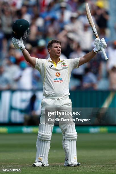 David Warner of Australia raises his bat after scoring 200 runs during day two of the Second Test match in the series between Australia and South...