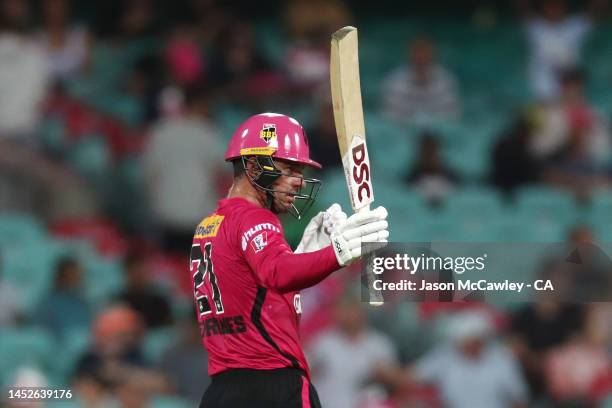 Moises Henriques of the Sixers celebrates after reaching their half century during the Men's Big Bash League match between the Sydney Sixers and the...