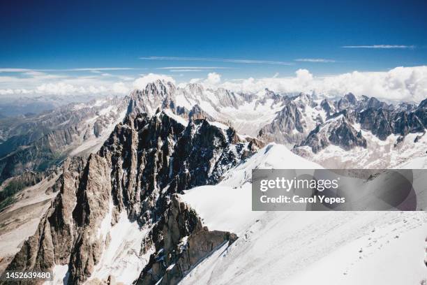 alps mountain building. aiguille du midi,chamonix,france - aiguille du midi stock-fotos und bilder