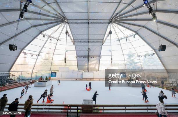 Several people skate on the ice rink at the Manantial de Sueños Park on December 26 in Madrid, Spain. Installed in the Manantial de los Sueños theme...
