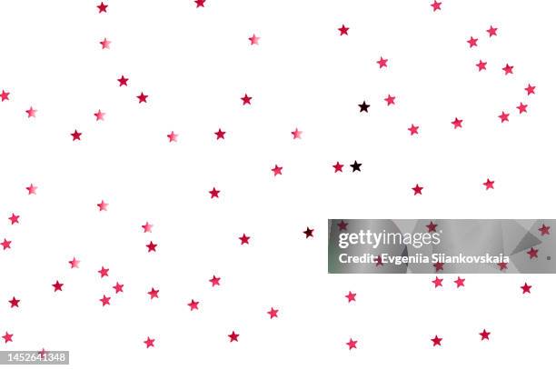 top view of viva magenta star shape confetti isolated on white background. - star confetti white background stockfoto's en -beelden