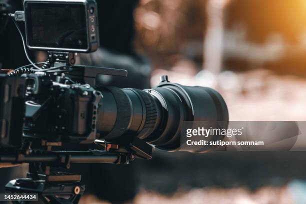 cinema camera telephoto film set still on the tripod - camera lens flare stock pictures, royalty-free photos & images