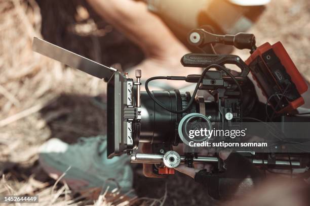 cinema camera set on the hands of filmmaker - film director asian stock pictures, royalty-free photos & images