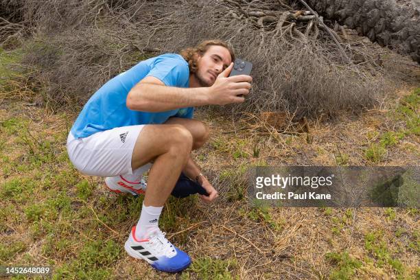 Stefanos Tsitsipas of Greece poses for a Quokka selfie during a United Cup media opportunity at Rottnest Island on December 27, 2022 in Perth,...