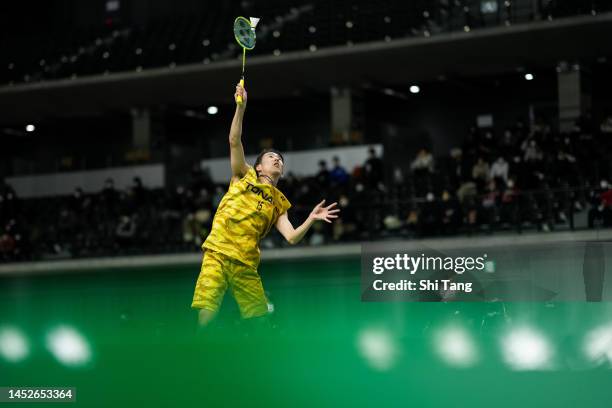 Kanta Tsuneyama competes in the Men's Singles Second Round match against Riku Hatano on day two of the 76th All Japan Badminton Championships at...