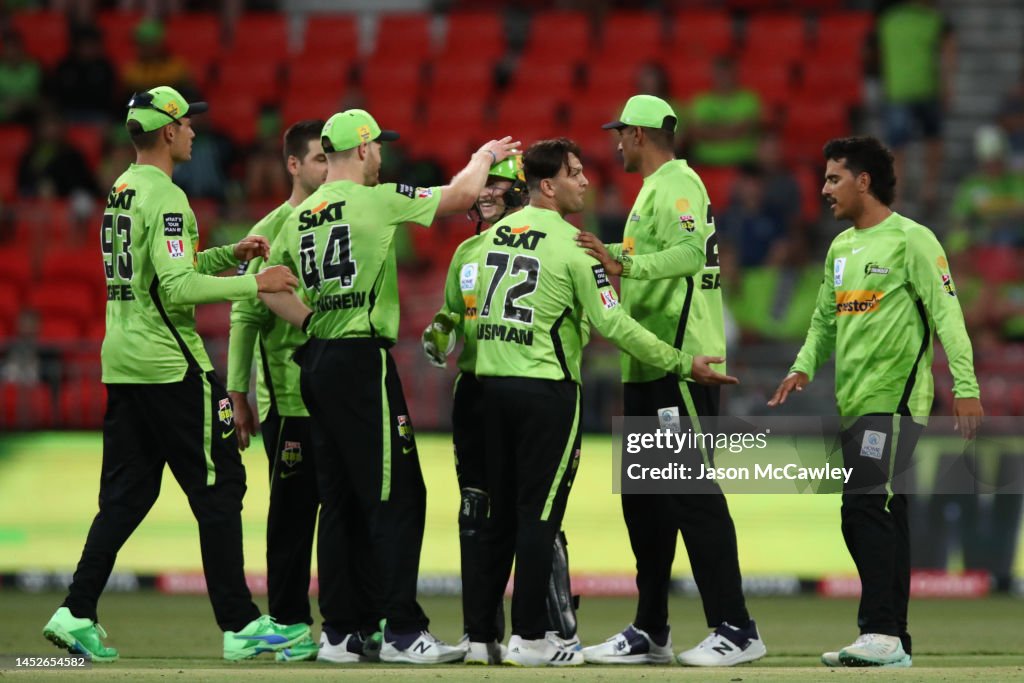 Usman Rgh Usman Qadir of the Thunder celebrates after taking the wicket of ...