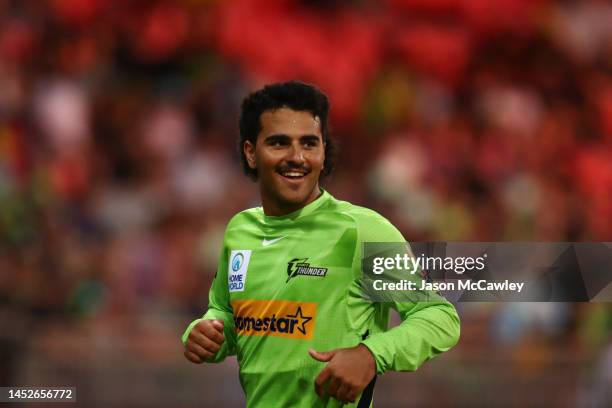 Oliver Davies of the Thunder fields during the Men's Big Bash League match between the Sydney Thunder and the Brisbane Heat at Sydney Showground...