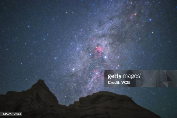 Starry sky is pictured over the Yadan landform, or dry areas with wind erosion landscape, on September 8, 2021 in Hami, Xinjiang Uyghur Autonomous...
