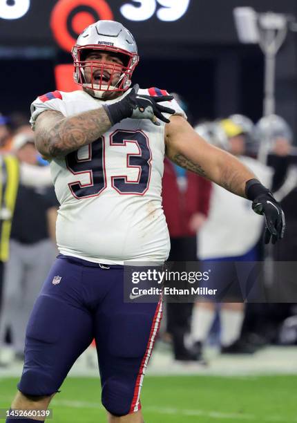 Defensive end Lawrence Guy of the New England Patriots celebrates a sack against the Las Vegas Raiders in the second half of their game at Allegiant...