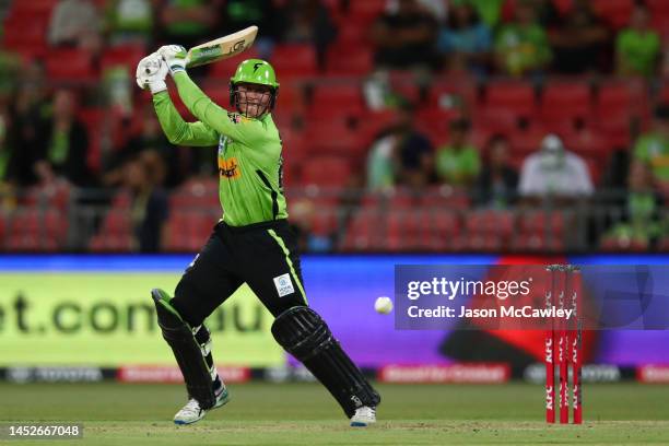 Matthew Gilkes of the Thunder bats during the Men's Big Bash League match between the Sydney Thunder and the Brisbane Heat at Sydney Showground...