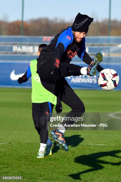 Neymar Jr controls the ball during a Paris Saint-Germain training session at PSG training center on December 27, 2022 in Paris, France.