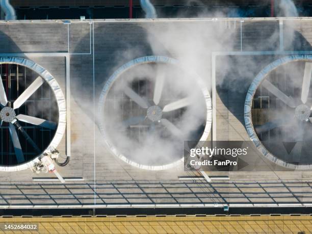 cooling equipment in a modern factory, fans are working - tabuleiro para arrefecer imagens e fotografias de stock