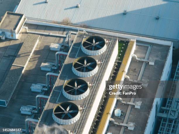 cooling equipment in a modern factory, fans are working - tabuleiro para arrefecer imagens e fotografias de stock