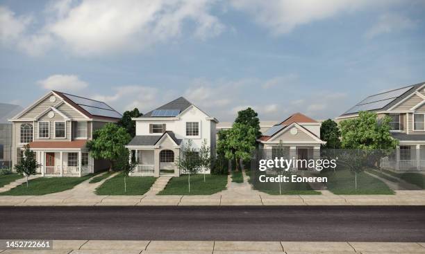 casas con paneles solares - suburbio zona residencial fotografías e imágenes de stock