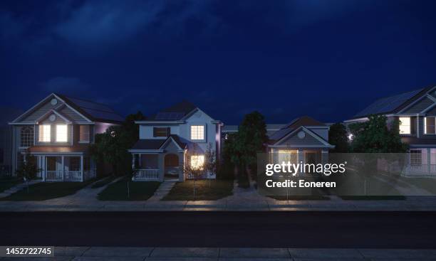 houses with solar panels - residential building night stock pictures, royalty-free photos & images