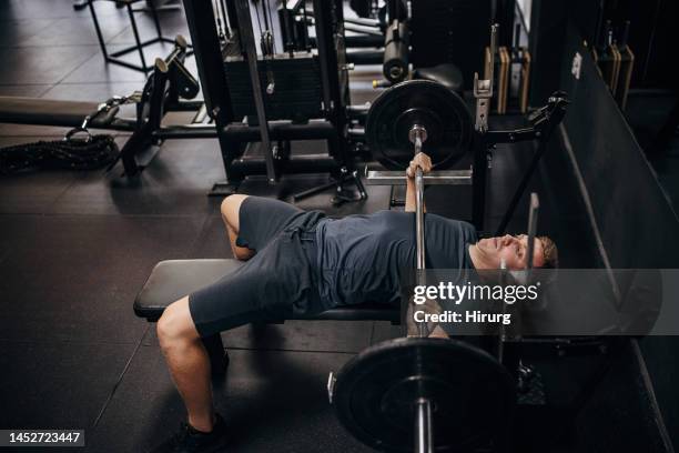 bench press exercise - weight bench stock pictures, royalty-free photos & images