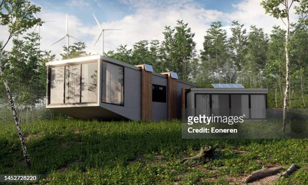 modern energy efficient house with solar panels - green roof stock pictures, royalty-free photos & images