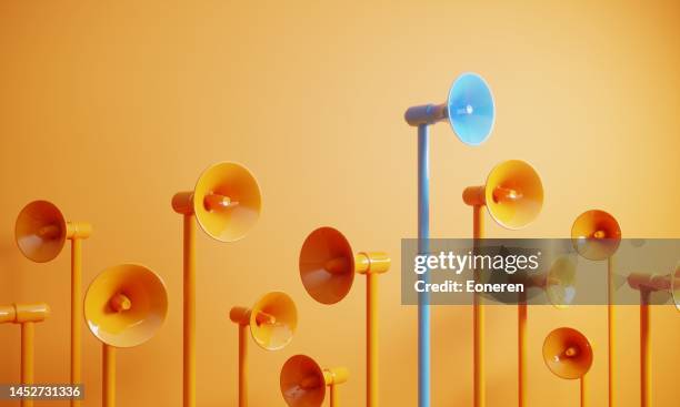 blue colored megaphone standing out from the crowd - loudspeaker bildbanksfoton och bilder