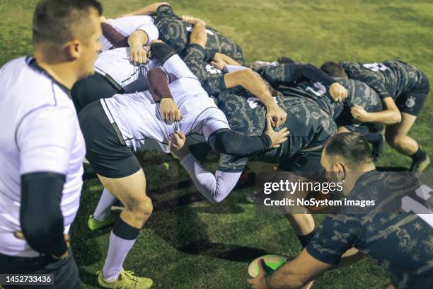 rugby team practicing scrum - rugby league scrum stock pictures, royalty-free photos & images