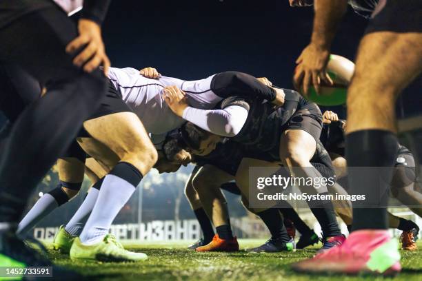 rugby team practicing scrum - rugby league scrum stock pictures, royalty-free photos & images