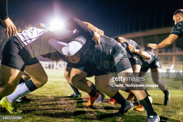 rugby team practicing scrum - rugby league scrum stock pictures, royalty-free photos & images
