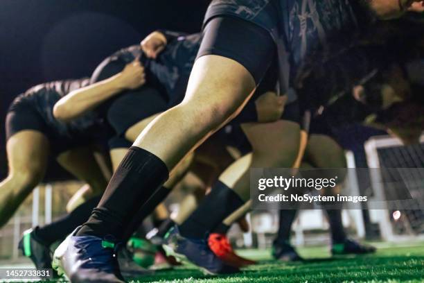 rugby team practicing scrum - rugby league scrum stock pictures, royalty-free photos & images