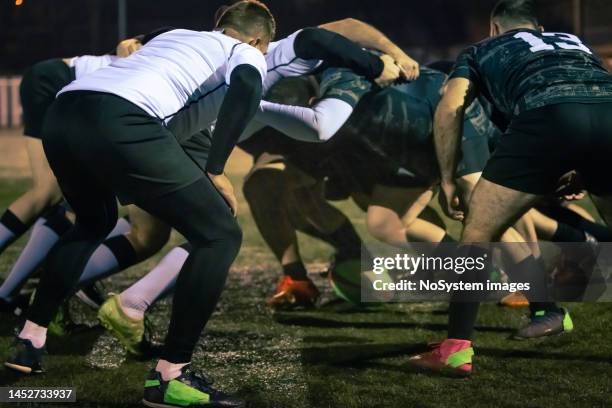 rugby team practicing scrum - rugby league scrum stock pictures, royalty-free photos & images